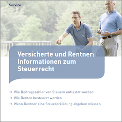 Zwei Männer unterschiedlichen Alters stehen in einer Grünanlage und gehen einer Freizeitbeschäftigung nach Zwei Männer unterschiedlichen Alters stehen in einer Grünanlage und gehen einer Freizeitbeschäftigung nach