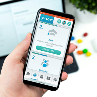 Handy auf dem die Plattform Mico geöffnet ist Handy auf dem die Plattform Mico geöffnet ist